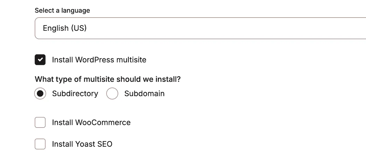 用于设置新 WordPress Multisite 实例的 Kinsta 对话框。它显示了语言选择界面，选择选项为英语（美国），随后是 WordPress Multisite 安装选项。该界面包含一个用于选择安装类型的单选按钮，可在 Subdirectory（子目录）和 Subdomain（子域名）之间选择，当前选中了 Subdirectory。